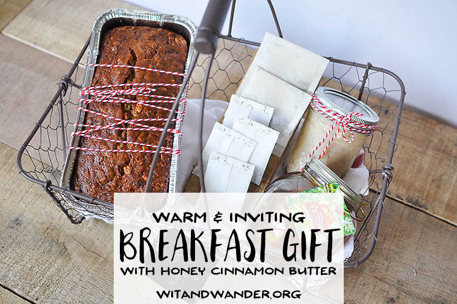 A sweet Breakfast Gift Basket Idea with banana bread, whipped honey cinnamon butter, Don Victor Honey, and assorted teas that will make someone feel the warmth of the holiday season.